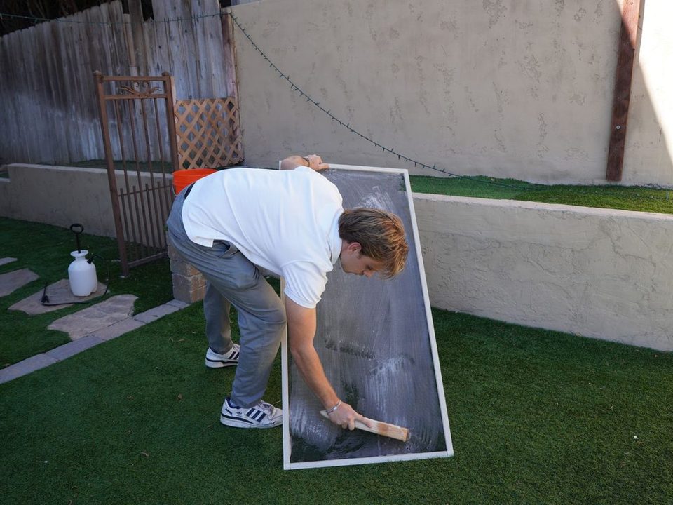 ORCA hand-cleaning a window screen